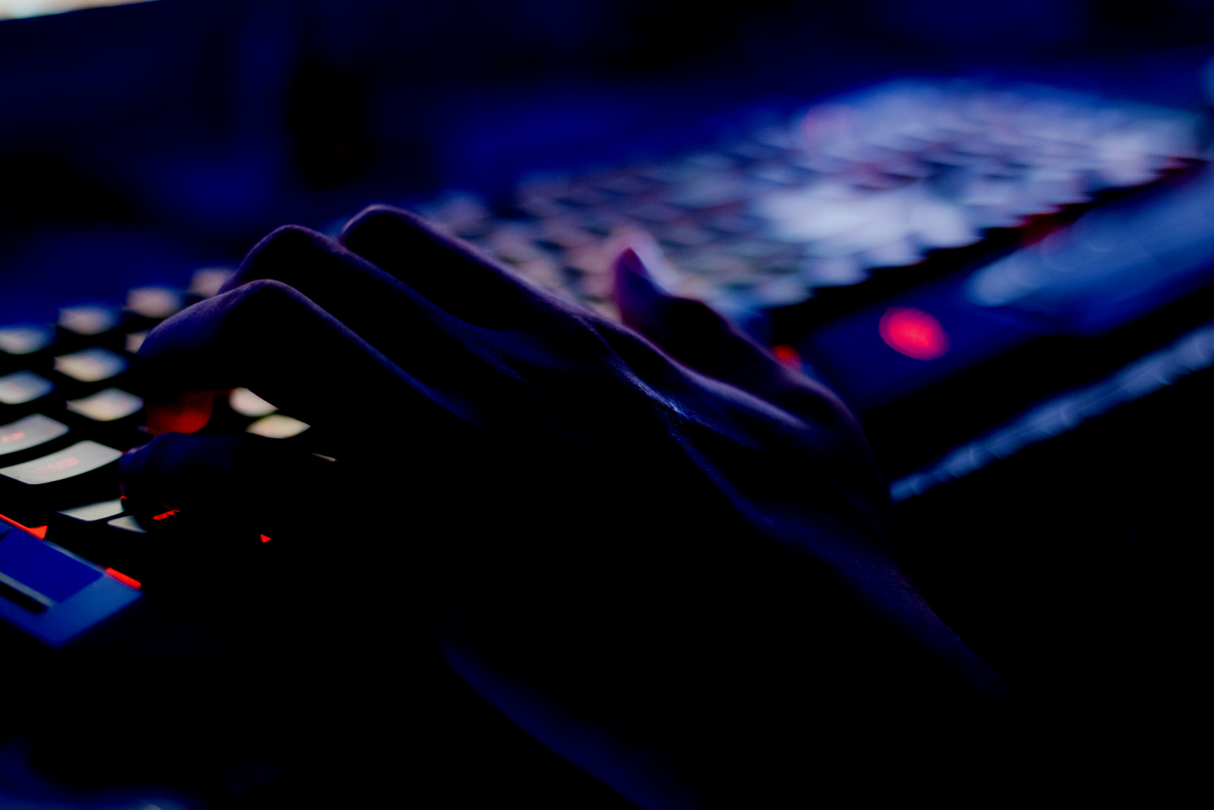Photo of Person Typing on Computer Keyboard